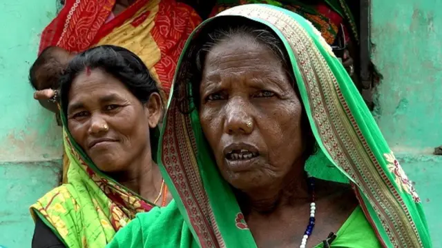 बाढीपीडित महिला