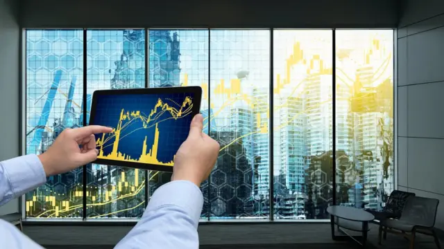 Un iPad con acciones