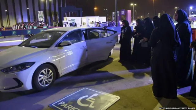 Saudi women wait for their turn to test a car during a driving workshop for women in the Saudi capital Riyadh on June 21, 2018