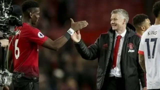 Paul Pogba na mkufunzi Ole Gunnar Solskjaer