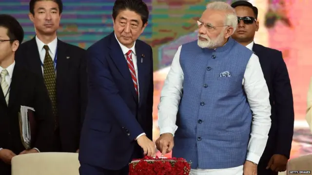 એબે અને વડાપ્રધાન મોદીની તસવીર