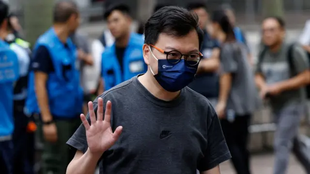 Kalvin Ho Kai-ming arrives at the West Kowloon Magistrates' Courts building, before the verdict of the 47 pro-democracy activists charged under the national security law, in Hong Kong, China, May 30, 2024. REUTERS/Tyrone Siu