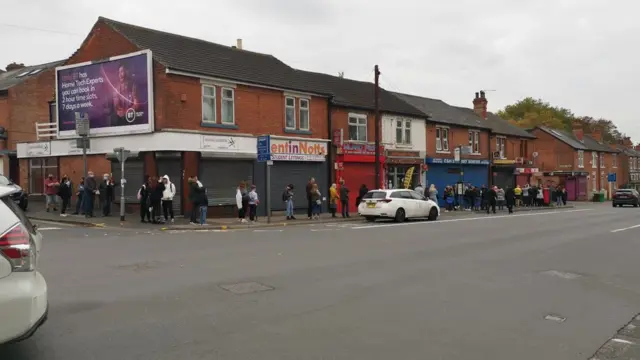 Queue to get a selfie of Banksy artwork