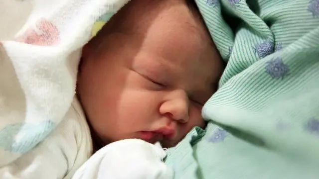 Новорожденный младенец