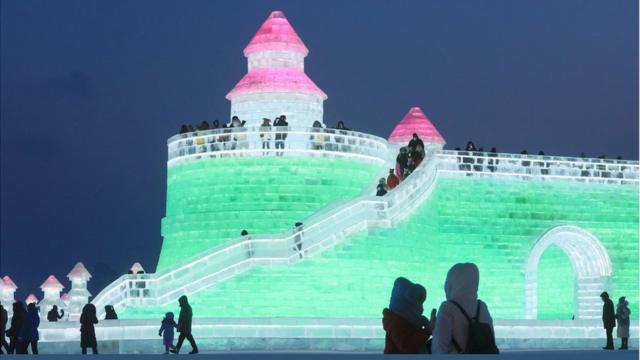 An illuminated ice tower