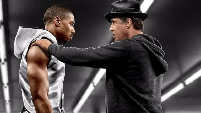 Фильм "Крид: Наследие Рокки" (2015) Райана Куглера рассказывает об одном из сыновей Аполло Крида, чью роль исполнил Майкл Б. Джордан