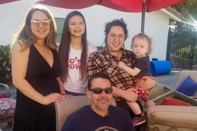 Cafferty with daughters and grandchildren