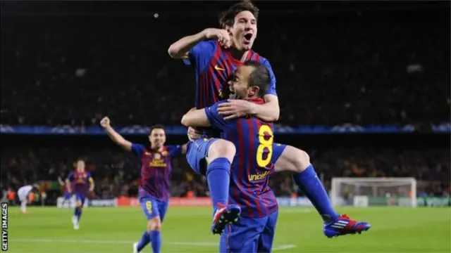 Iniesta and Messi dey jubilate