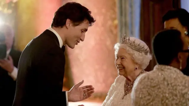 Queen Elizabeth II greets Canada's Prime Minister Justin Trudeau at Buckingham Palace in London on April 19, 2018.