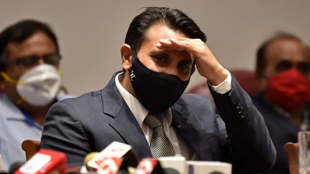 Adar Poonawalla in a face mask at a press conference in January