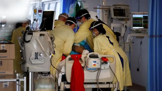 A Covid patient being turned in ICU early in the pandemic