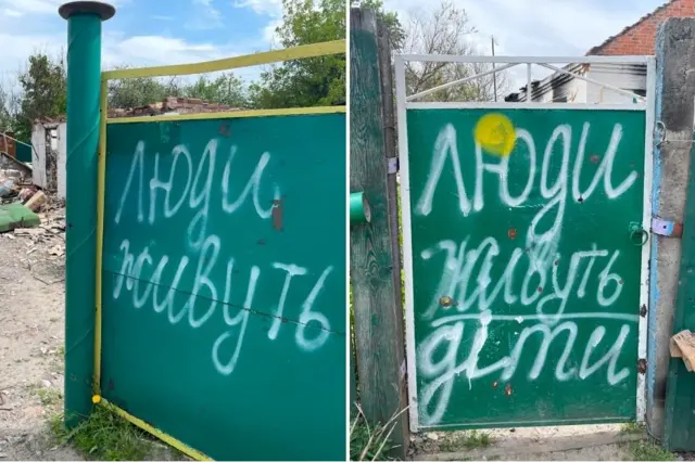 Những lời cầu xin bằng sơn ở Andriivka: "Người dân sống ở đây" (trái) và "Người dân sống ở đây - có trẻ em"