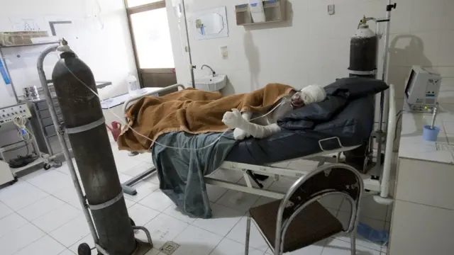 Hospital bed with a woman who tried to commit suicide