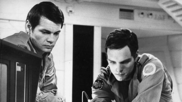 Actors Gary Lockwood (left) and Keir Dullea in a scene from '2001: A Space Odyssey', directed by Stanley Kubrick (1968)