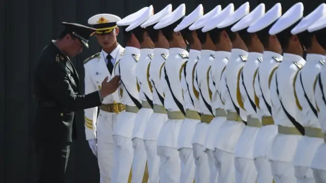 Chinese troops take part in a drill preparing for the parade