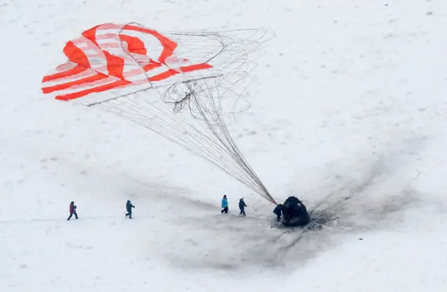 Search and rescue team approaches the Soyuz MS-09 capsule on 20 December 2018