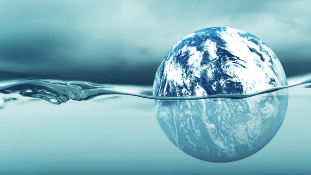 Illustración de un planeta parcialmente bajo agua