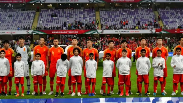 Chinese players lining up for the national anthem during the 2019 Asian Cup