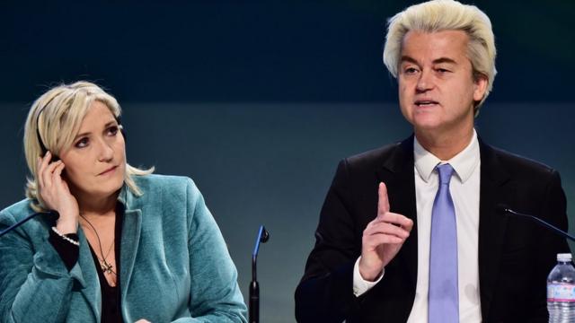 French National Front (FN) leader Marine Le Pen (L) and Dutch Freedom Party leader Geert Wilders (R) at first Europe of Nations and Freedom (ENF) congress in Milan, 29 Jan 16