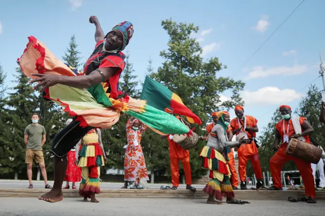 A dancer from Benin performs at the 6th CIOFF World Folkloriada (Folklore Festival) in the city of Ufa, Bashkortostan, Russia.