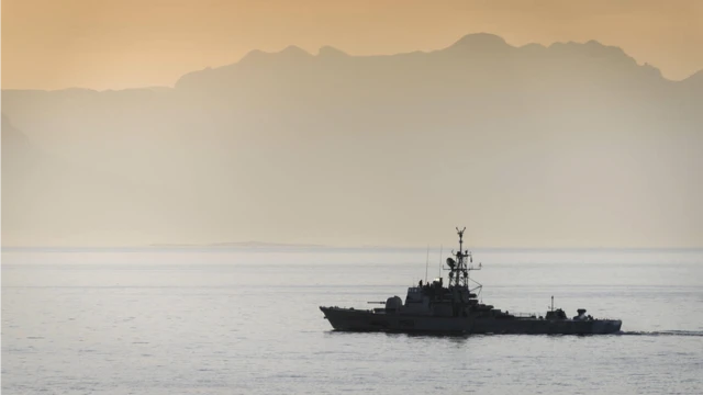 The South African Navy warship. SAS Makhanda, on patrol along the Cape Peninsula shoreline near Cape Town