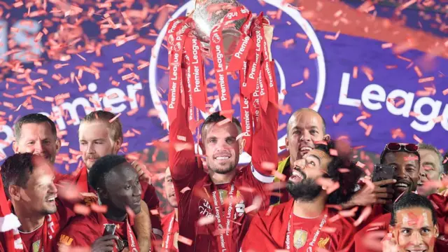 Liverpool lift the 2019/2020 Premier League trophy