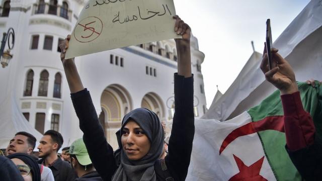 A young Algerian woman demonstrating in the capital Algiers on 5 March, 2019