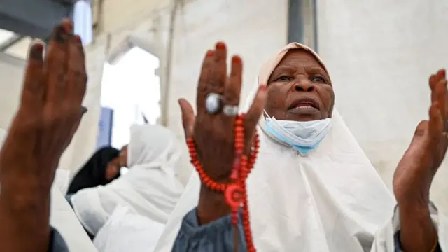 Une femme en prière