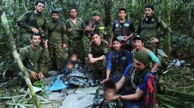 Yaran a zaune tare da waɗanda suka ceto su