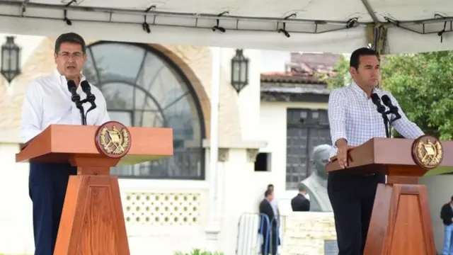 Juan Orlando Hernández y Jimmy Morales