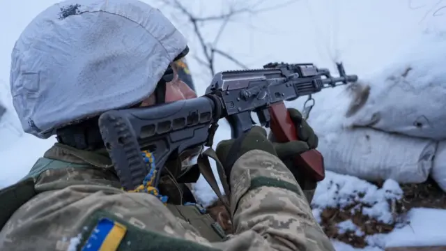 Ukrainian soldiers along the frontline near the town of Zolote, Ukraine