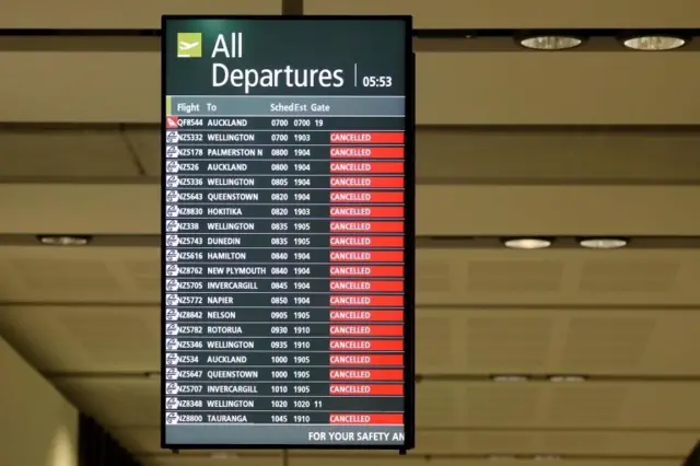 Una pizarra en una aeropuerto de Nueva Zelanda