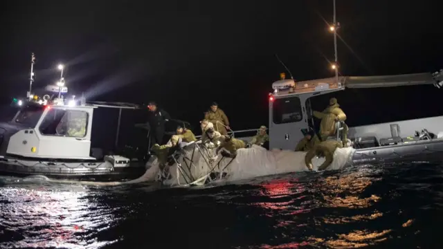 Balloon being hauled into boat