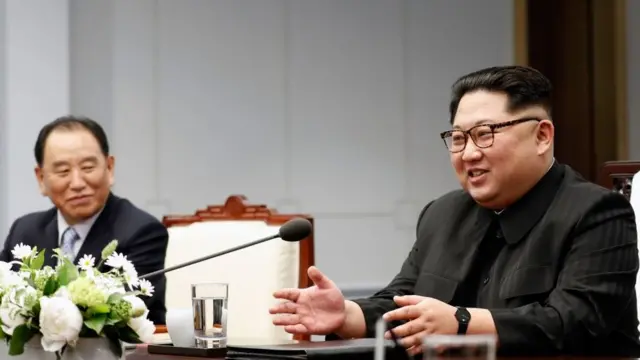 Kim Yong-chol, left, and Kim Jong-un