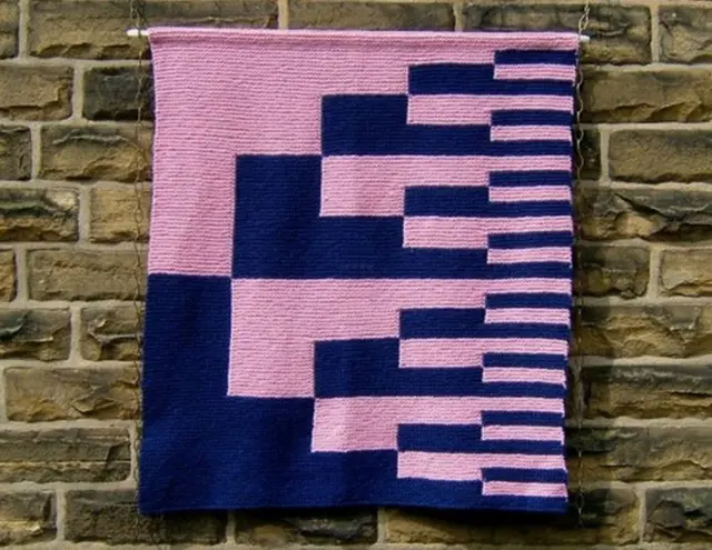 Tapete tejido a mano.