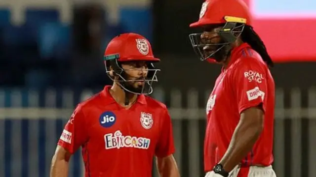 क्रिस गेल और मनदीप सिंह