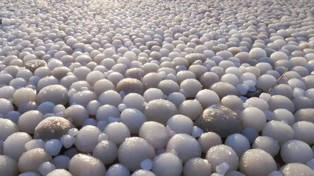 Picture by Risto Mattila of egg shaped balls on ice in Finland