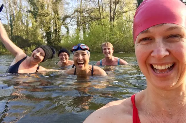 Women swimming in the river