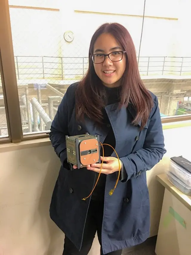 เอกจิรานำเอาดาวเทียมแนคแซทไปทดสอบการทำงานในสภาพจำลองของห้วงอวกาศที่ญี่ปุ่น