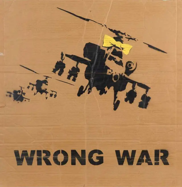 Banksy anti-Iraq War protest placards sell for £24,700 in 'bidding