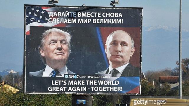 Плакат с Путиным и Трампом