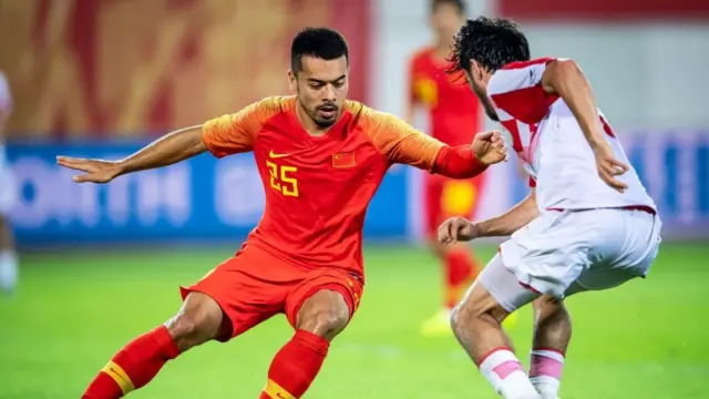 Yennaris in action for Chinsa in a friendly against Tajikistan in June