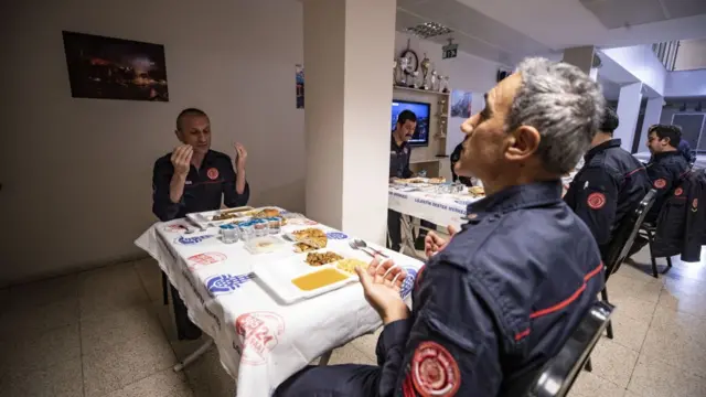 Firefighters eat fast-breaking (iftar) dinner in the first day of Muslim's holy month Ramadan in Istanbul, Turkey on April 24, 2020