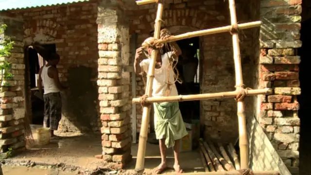Workers inside the house
