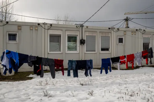 Washing hangs outside a the temporary units at the module city on the outskirts of Kharkiv.