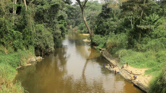 People pictured on the banks of the River Loya, DR Congo - Saturday 19 March 2022