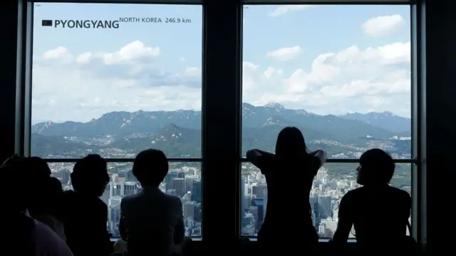 Pyongyang'a bakan Güney Koreliler