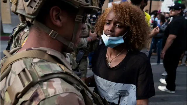 Protester and National Guard soldier in Los Angeles on 2 June