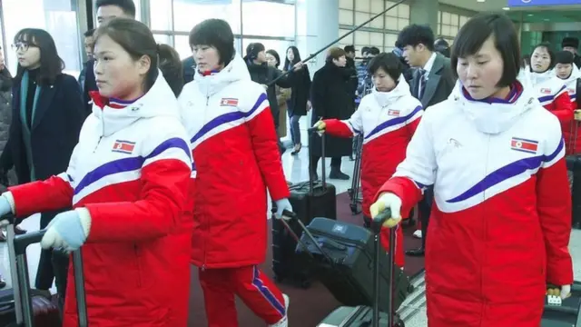 North Korea's women's ice hockey players arrive at the inter-Korea transit office