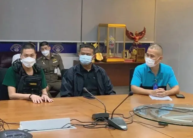 ภาพผู้ต้องหาและตำรวจ